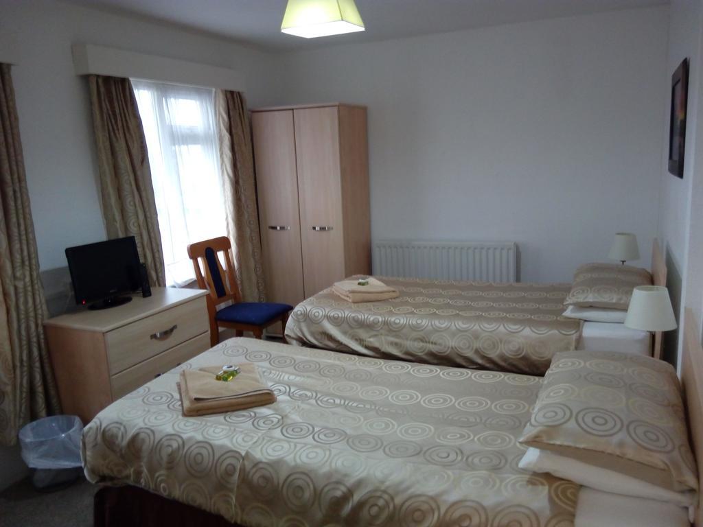 Wayside Cheer Hotel Castel Zimmer foto