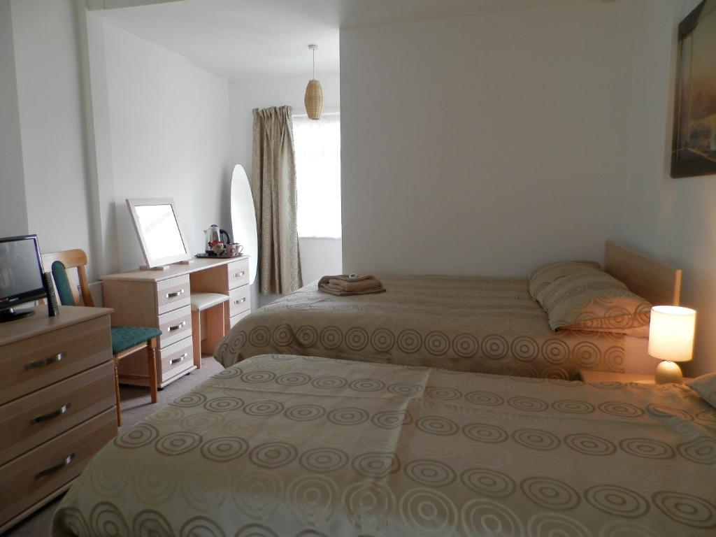 Wayside Cheer Hotel Castel Zimmer foto