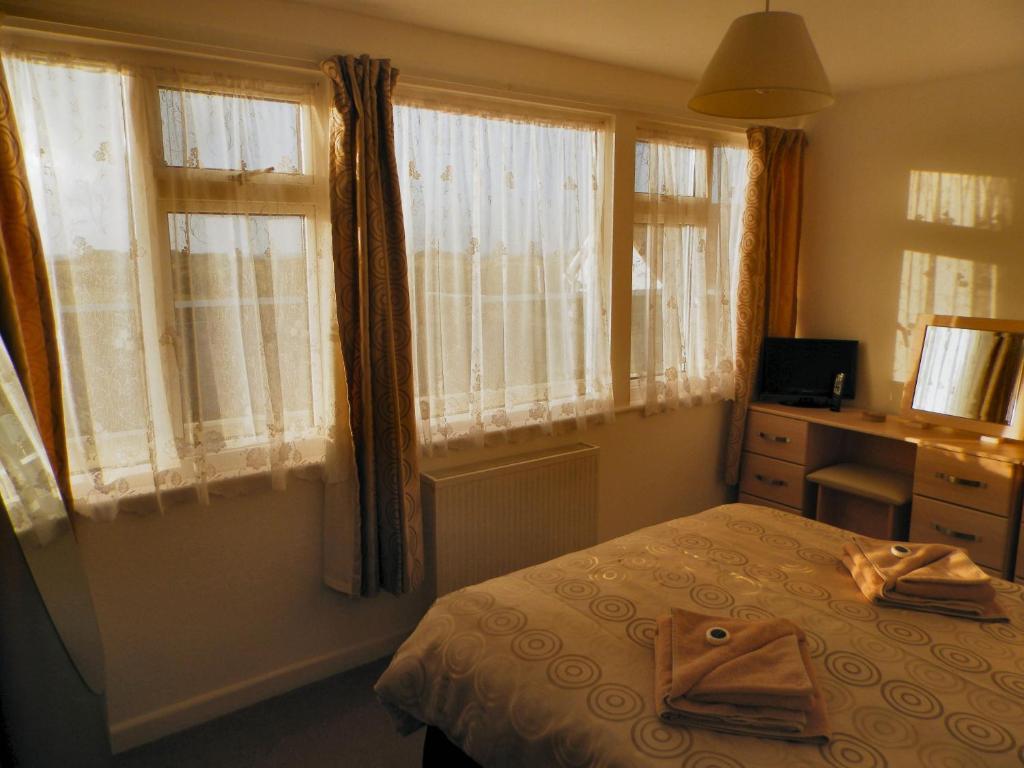 Wayside Cheer Hotel Castel Zimmer foto