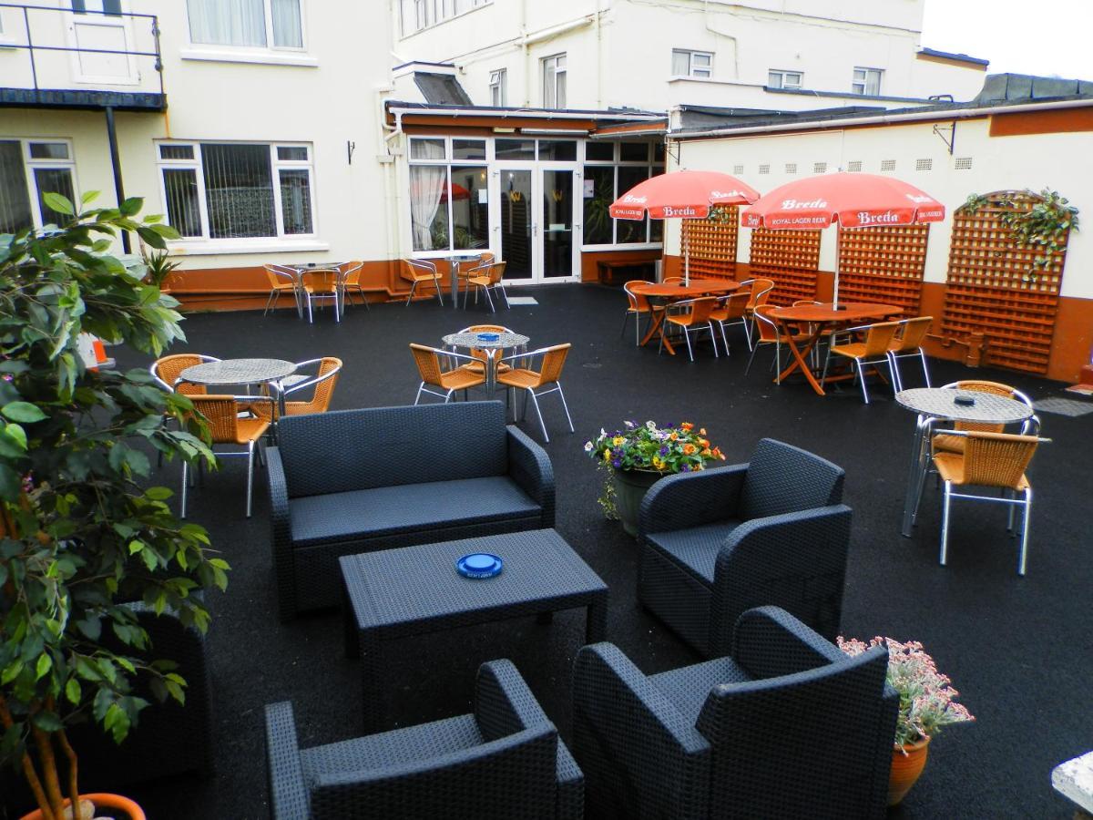 Wayside Cheer Hotel Castel Exterior foto